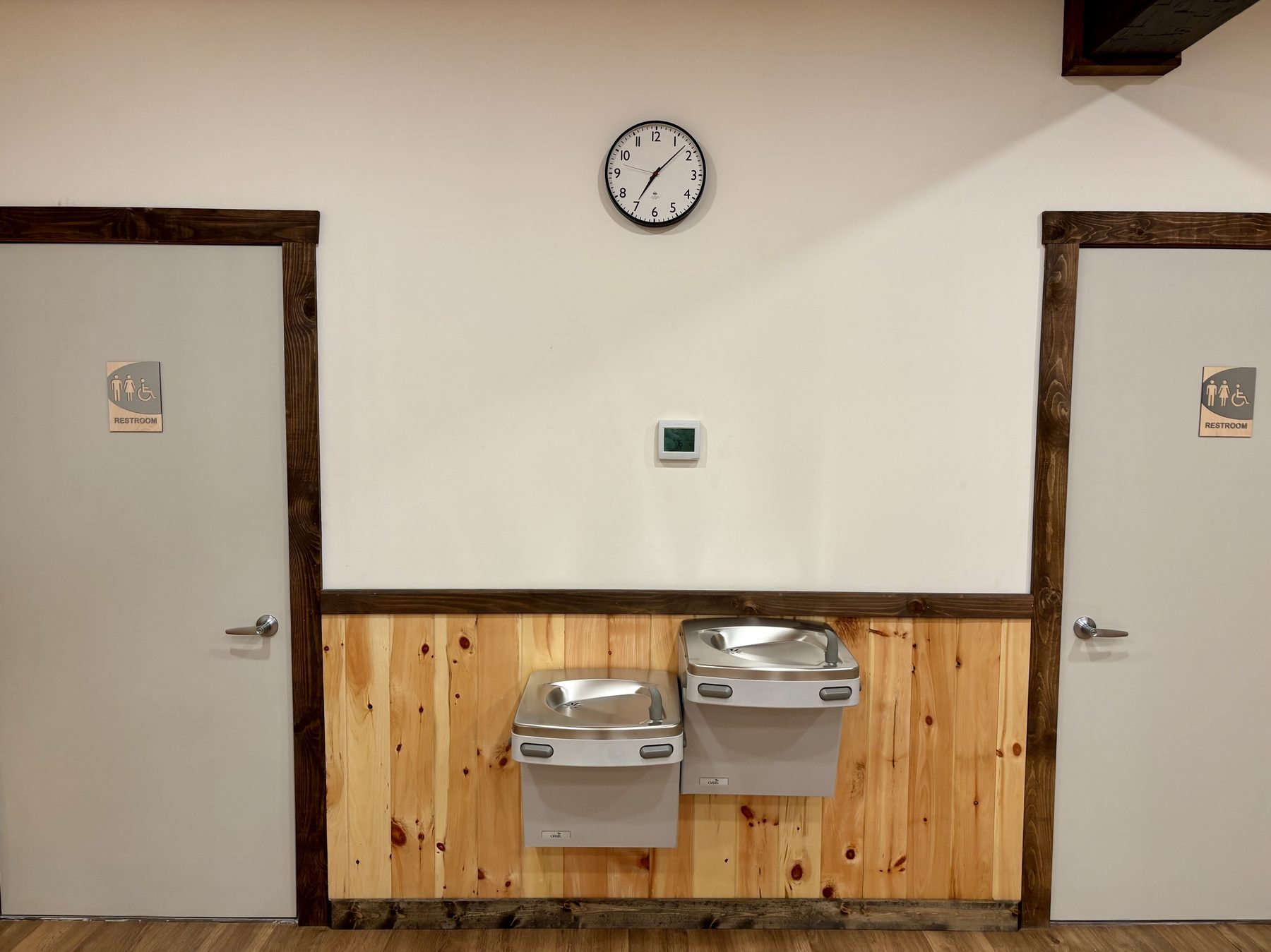 Restroom hallway with accessible water fountains